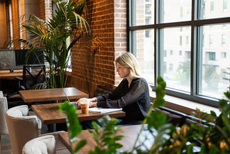 Bri working in a coworking space at HAVN